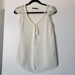 Sheer cream top with delicate lace cap sleeves